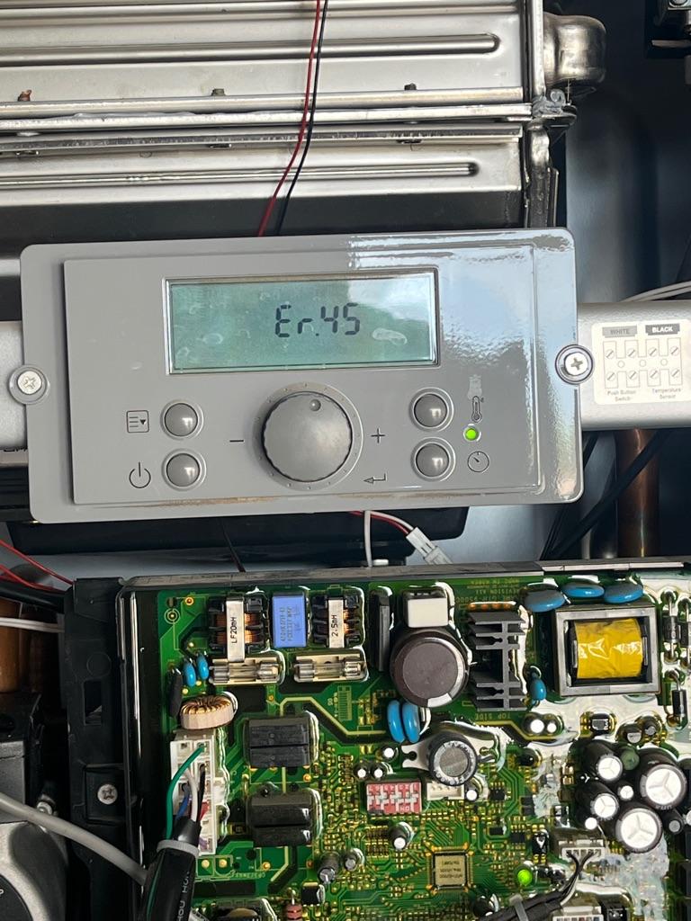 Error Code 45 on tankless water heater control panel indicating internal leak, Las Vegas repair by Focus Plumbing